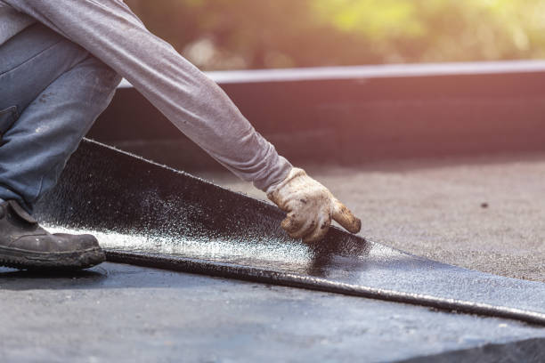 Professional Emergency Waterproofing technician working in Fremont, MI